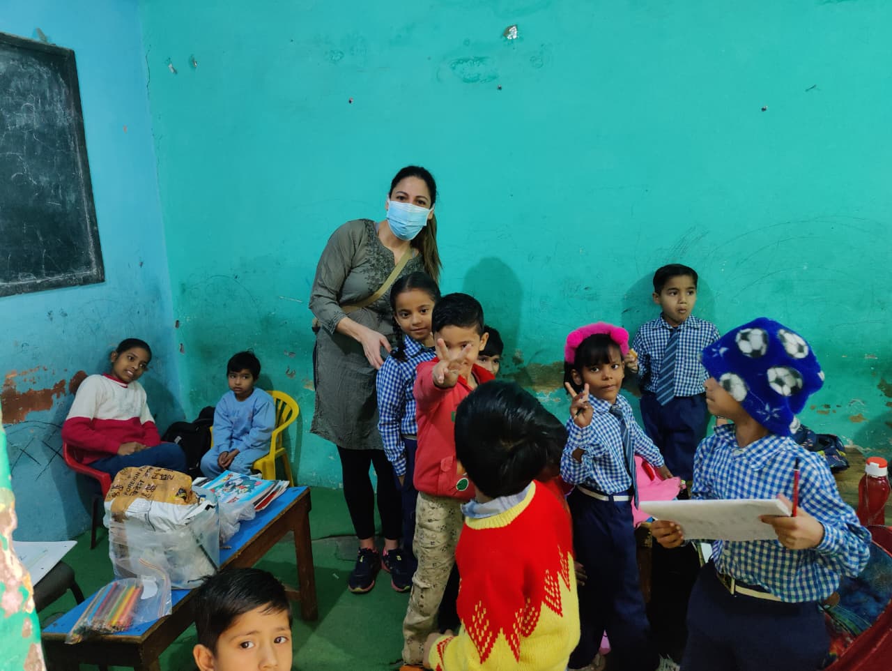 Volunteer with school children in India